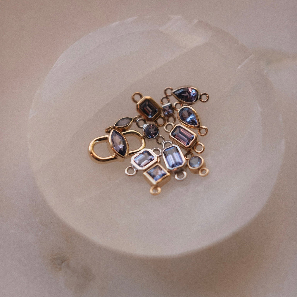 natural tanzanite gemstones set in solid gold