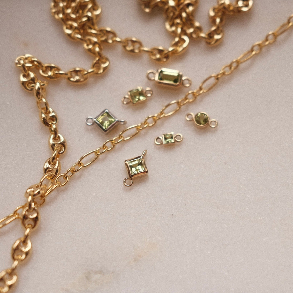 Natural peridot gemstones and solid gold chains