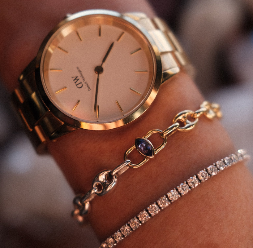 custom love saro 14K solid gold bracelet adorned with a gemstone